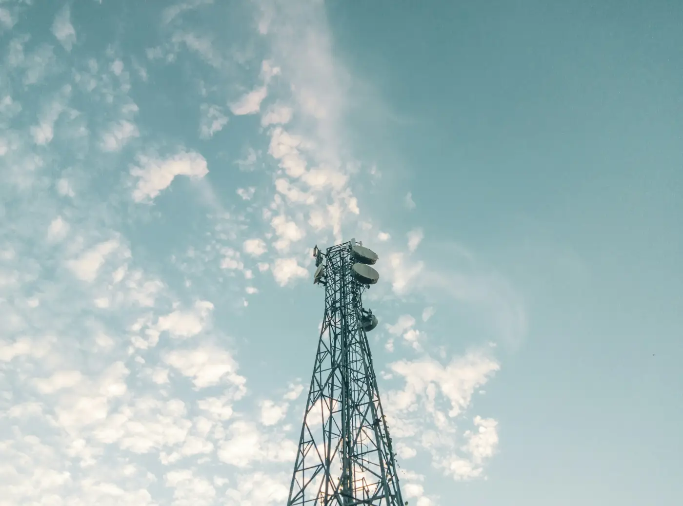 Antennas mounted near the top of a mobile tower